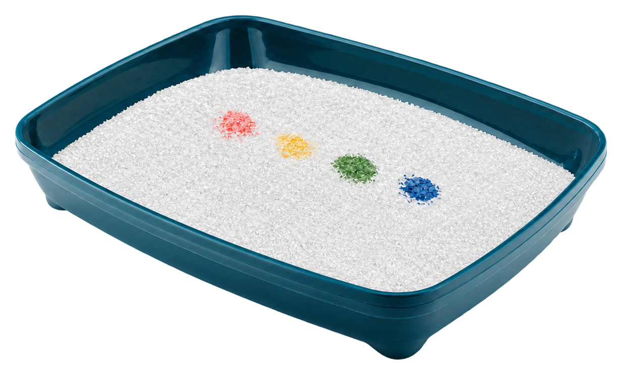 Litter box with four colored crystal spots
